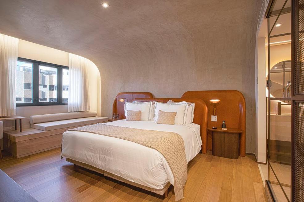 Qoya Hotel Curitiba, Curio Collection By Hilton Экстерьер фото A bedroom at the hotel